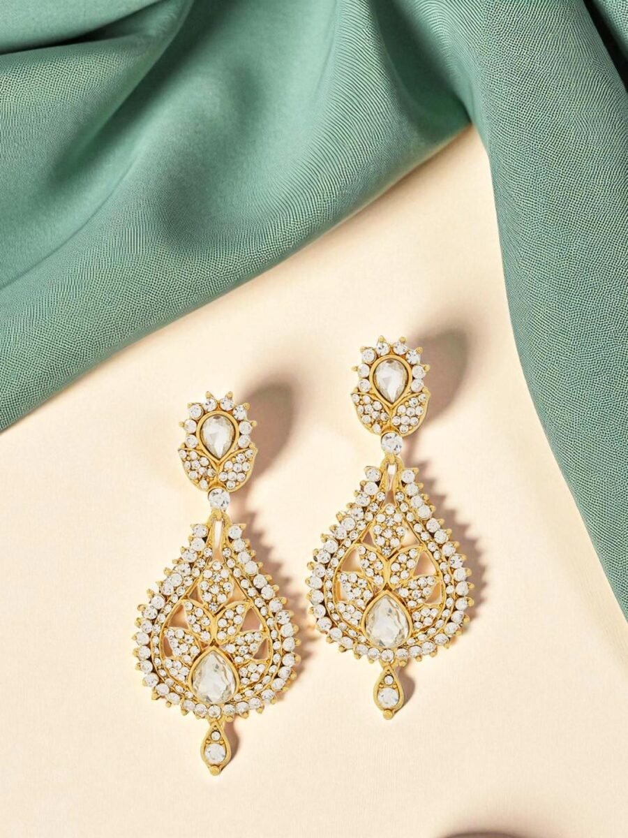 Gold plated white stones studded matka shaped drop earrings